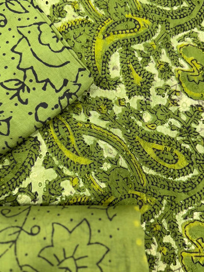 Close-up of green fabric with paisley pattern
