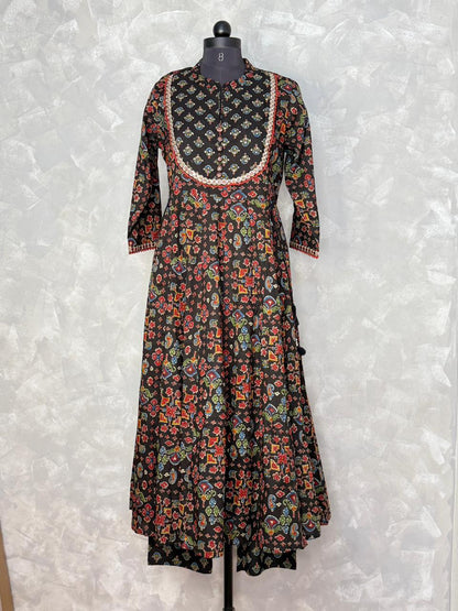 Floral patterned dress on a mannequin against a white background