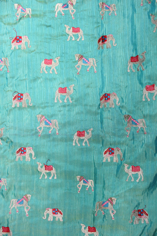 VIBRANT TEAL FABRIC WITH ANIMAL MOTIF FABRIC