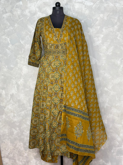 Yellow patterned dress with dupatta on a white background